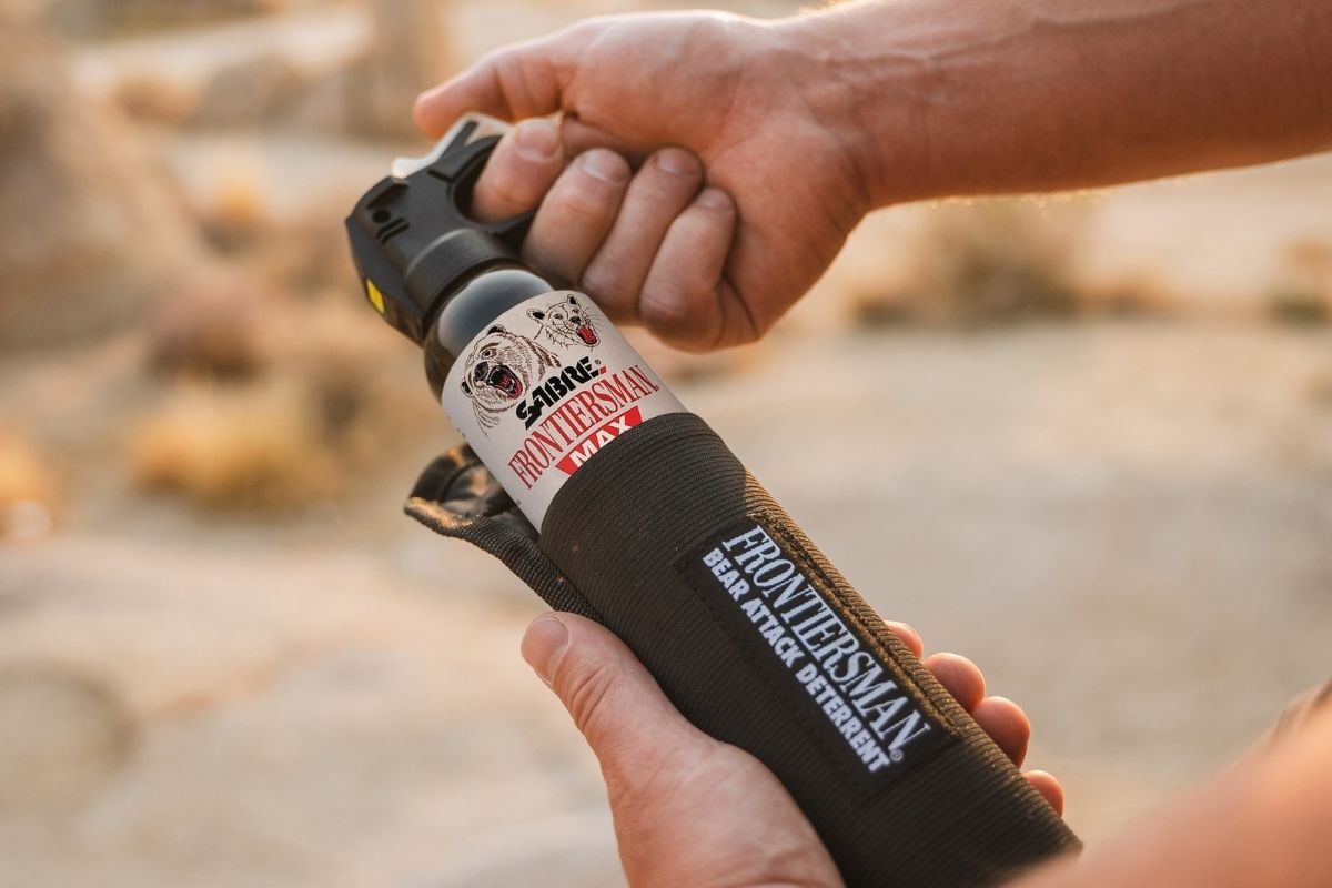 carrying bear spray in belt holster allows for quick access 